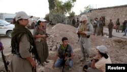 Borci Kurdistanske radničke stranke (PKK) učestvuju u borbi protiv militanata Islamske države, grad Makhmur, 9. avgust