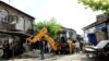 Armenia -- The Table-top Sale in Firdousi street in downtown Yerevan in beeing demolished. 19July, 2017