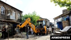 Armenia -- The Table-top Sale in Firdousi street in downtown Yerevan in beeing demolished. 19July, 2017