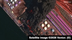 تأسیسات نفت اوست-لوگا در میان دود و آتش