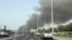 Smoke billows from Zayed port after an Iranian attack, following United States and Israel strikes on Iran, in Abu Dhabi