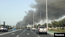 UAE - Smoke billows from Zayed port after an Iranian attack, Abu Dhabi, March 1, 2026.