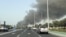 Smoke billows from Zayed port after an Iranian attack, following United States and Israel strikes on Iran, in Abu Dhabi