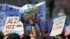 Rome, Italy - Students attend a protest to demand action on climate change, in Piazza del Popolo,