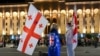 Georgian anti-government demonstrators protest outside Georgia's parliament in central Tbilisi (file photo)