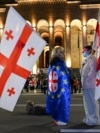 Georgian anti-government demonstrators protest outside Georgia's parliament in central Tbilisi (file photo)