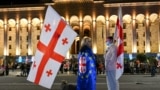 Georgian anti-government demonstrators protest outside Georgia's parliament in central Tbilisi (file photo)