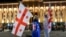 Georgian anti-government demonstrators protest outside Georgia's parliament in central Tbilisi (file photo)
