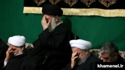 Iran's Supreme Leader Ali Khamenei (C), Iranian President Hassan Rouhani(2nd R) and the top IRGC commander Mohammad Ali Jafari, in a religious ceremony in Tehran on March 2, 2017.