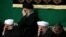 Iran's Supreme Leader Ali Khamenei (C), Iranian President Hassan Rouhani(2nd R) and the top IRGC commander Mohammad Ali Jafari, in a religious ceremony in Tehran on March 2, 2017.
