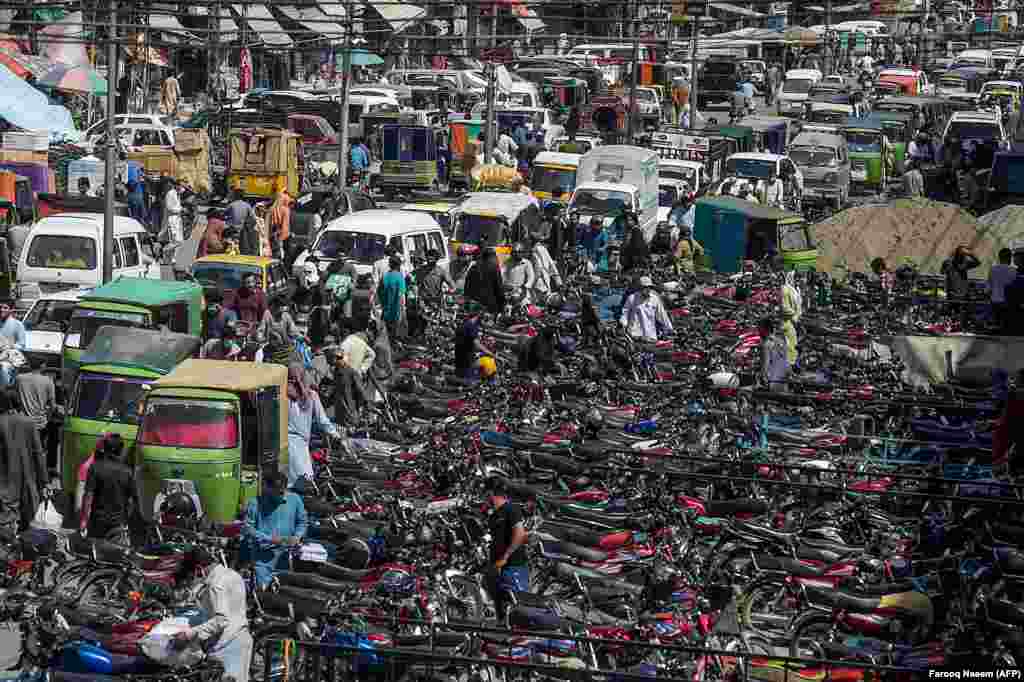 The area around the Raja Bazar in the Pakistani city of Rawalpindi was jammed with motorbikes on May 21 as people flocked to markets ahead of the Eid al-Fitr festival.