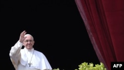 Pope Francis delivers his Easter blessing from the balcony of St Peter's Basilica in the Vatican on April 1. 