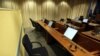 A view of the empty seat where Radovan Karadzic was supposed to sit while attending the start of his trial at the War Crimes Tribunal in The Hague.