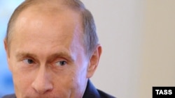 Russian Prime Minister Vladimr Putin -- soon to be banging his shoe?