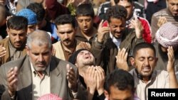 Sunni Muslims attend Friday Prayers during an antigovernment demonstration in the Iraqi city of Fallujah on February 1.