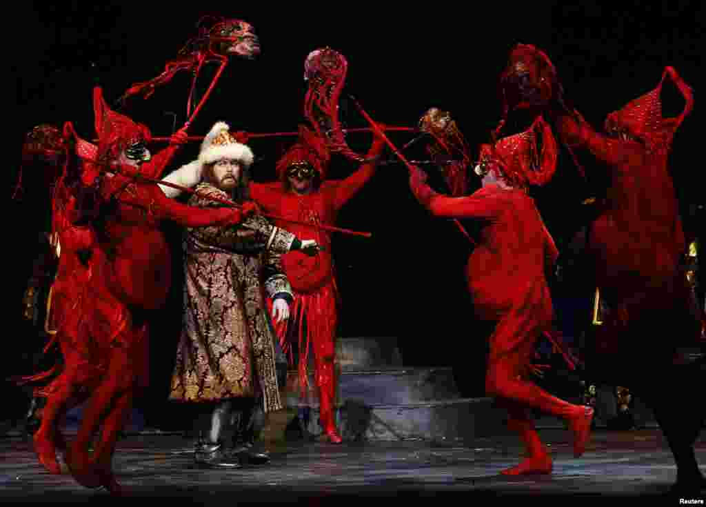 Members of the Novaya Opera Theater of Moscow, with Sergei Artamonov as Prince Igor (second from left), perform during a rehearsal of &quot;Prince Igor&quot; by Aleksandr Borodin at the Coliseum theater in London. (Reuters/Luke MacGregor)