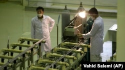 Iranian technicians work at a facility near the city of Isfahan that produces uranium fuel. (file photo)