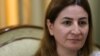 Lawmaker Vian Dakhil says she will return to the Iraqi parliament once she is fully recovered from injuries suffered in a helicopter crash on Mount Sinjar in August.