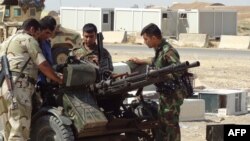 Члены курдских вооруженных формирований на военной базе около Киркука. Архивно-иллюстративное фото, 2014