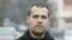 Marko Jaksic, a young lawyer and councilor in the Mitrovica Municipal Assembly in front of the party "Freedom, Democracy, Justice - Oliver Ivanovic"