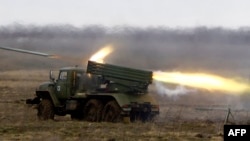 A Russian BM-21 Grad multiple-launch rocket system launches rockets during military exercises in the southern Volgograd region in April.
