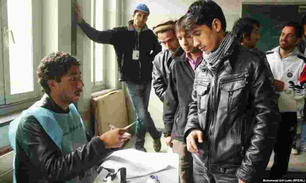 Afghanistan - Afghan people in a voting center in Kabul, cast their votes to select the future president and members of Kabul provincial council, 05 April 2014