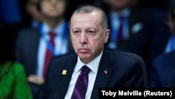 Turkish President President Tayyip Erdogan attends the NATO leaders summit in Watford on December 4.