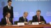 Ілюстративне фото. Справа наліво: президент України Петро Порошенко, тодішній прем'єр-міністр Молдови Юріє Лянке, та, на той час, прем'єр-міністр Грузії Іраклі Гарібашвілі. Брюссель, червень 2014 року