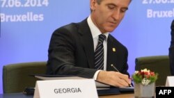 Ираклий Гарибашвили подписывает соглашение об ассоциации Грузии с ЕС 
