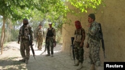 Afghan security forces patrolling a village in Helmand in October 2015.
