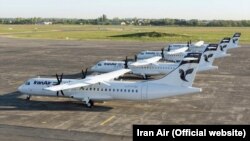 Four French-made ATR-72 owned by Iran Air sit on the hanger of Iran Air in Tehran, undated.