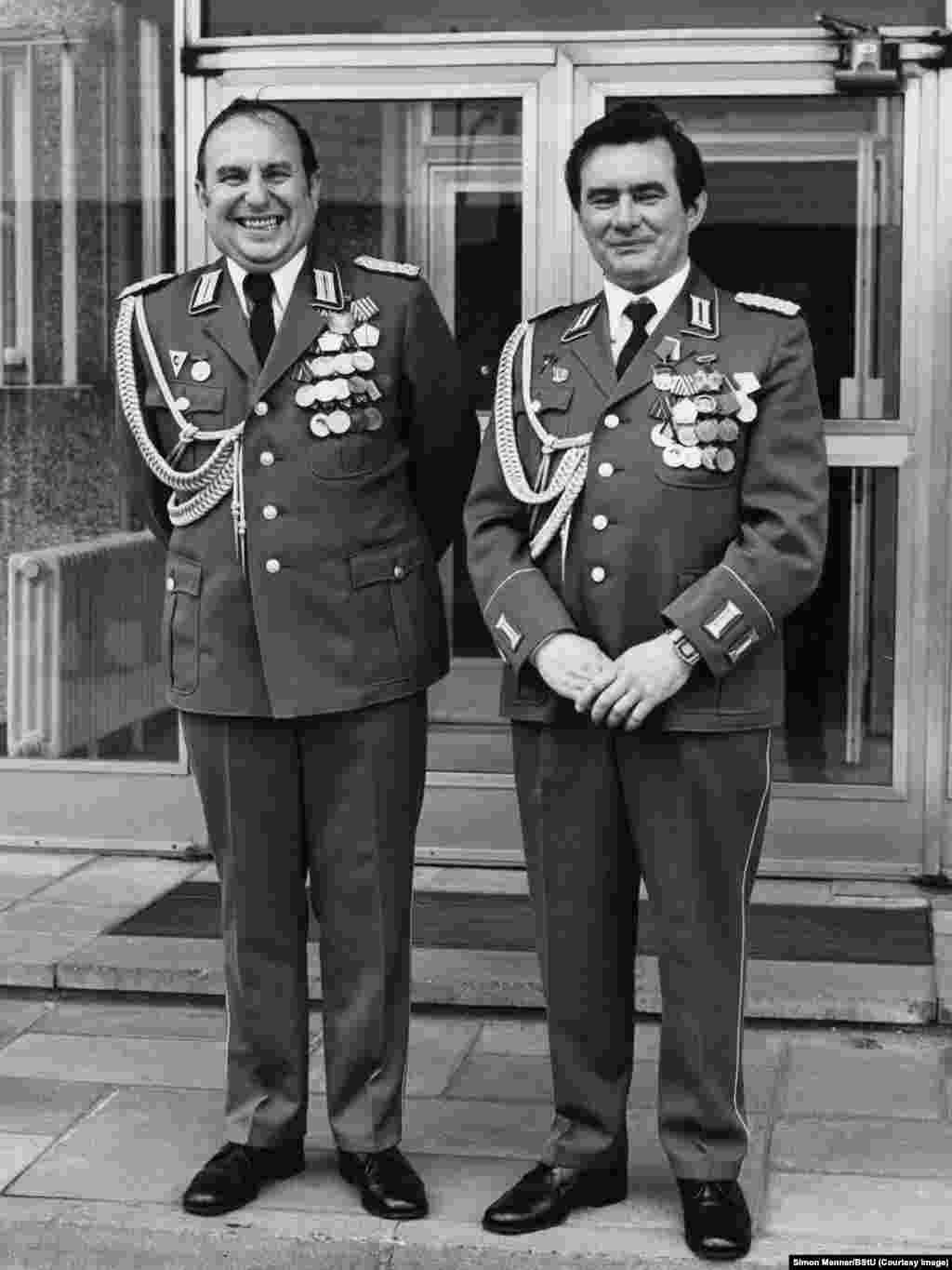 Unidentified officers in front of the Stasi headquarters, the Ministry for State Security, in Berlin. Menner says he is finished with exploring the archive of millions of once-secret Stasi photos, but says, "There is still so much more to see; it's endless material."
