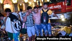 Пострадавшие во время давки в Турине, 3 июня 2017 года.