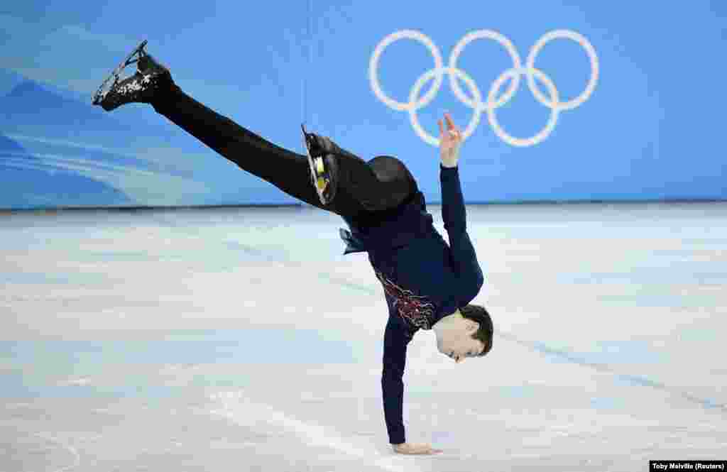 Figure skater Moris Kvitelashvili of Georgia competes in the men&#39;s singles short program at the Winter Olympics in Beijing on February 4.