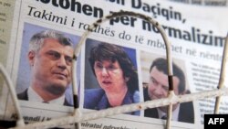 A local newspaper in Pristina shows Kosovar Prime Minister Hashim Thaci, European Union foreign policy chief Catherine Ashton, and Serbian Prime Minister Ivica Dacic (left to right) the day after their first meeting on October 19.