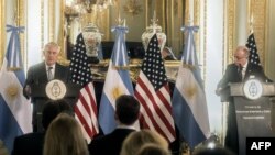 United States's Secretary of State Rex Tillerson (L) speaks next to Argentina's Foreign Minister Jorge Faurie (R) at a press conference.