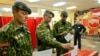 Belarus -- Special anti-terrorist troops commandos leave a polling booth during pre-term election in the army in Minsk, 23Sep2008