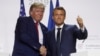 French President Emmanuel Macron shakes hands with then-U.S. President Donald Trump after a joint press conference at the end of a G7 summit in France in 2019.