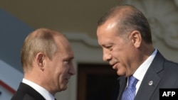 Президент Росії Володимир Путін (ліворуч) і президент Туреччини Реджеп Тайїп Ердоган, 5 вересня 2013 року