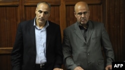 Iranians Said Mansur Musavi (left) and Ahmad Abolfathi Mohammed during their May 6 trial in Nairobi, Kenya
