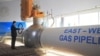 Turkmen President Gurbanguly Berdymukhammedov takes part in the opening ceremony of the East-West pipeline at the Belek compressor station on December 23, 2015.