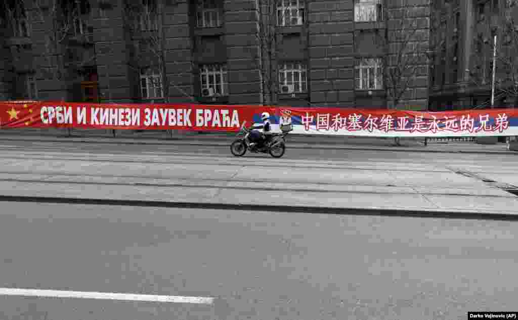 A banner in central Belgrade on April 18 saying: “Serbs And Chinese, Brothers Forever.” Ognjen Zoric, a Serbian journalist with RFE/RL’s Balkan Service, says there is genuine goodwill toward China among the Serbian public, especially after the 1999 NATO bombing of Yugoslavia that China opposed, but signs like these may be aimed at getting the EU’s attention. Serbia has been a candidate for EU accession since 2011.