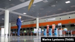 Опустевшая зона регистрации в международном аэропорту Шереметьево в первый день прекращения авиасообщения с другими странами в целях предотвращения распространения коронавирусной инфекции COVID-19
