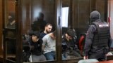 A group of defendants accused of involvement in the 2024 Crocus City Hall music venue gun attack that killed 149 people, goes on trial in Moscow on August 4, 2025. (Photo by Alexander NEMENOV / AFP)