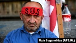 A protester outside the Georgian parliament on July 3.