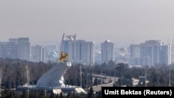A golden monument to Turkmenistan’s former President Gurbanguly Berdymukhammedov in Ashgabat photographed on March 20.