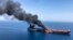 An oil tanker is on fire in the sea of Oman, June 13, 2019.