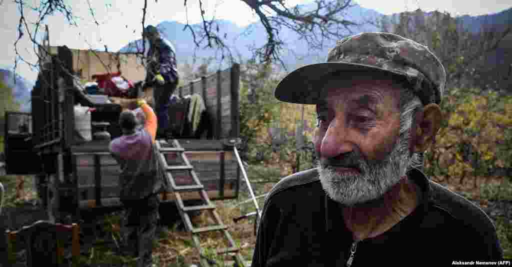 Armenians pack their belongings while leaving their house in the town of&nbsp;Kalbacar (known as Karvachar in Armenian). Kalbacar is one of the seven districts that will be transferred to Azerbaijan as part of a truce deal that ended fighting over the breakaway region of Nagorno-Karabakh. (AFP/Alexander Nemenov)