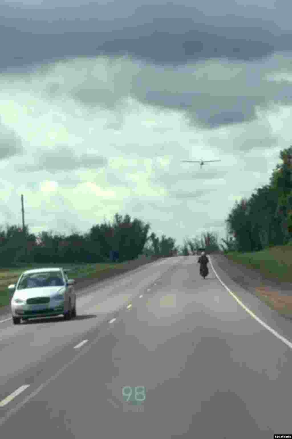 A frame grab from an amateur video showing a US-made Hornet attack drone flying at low altitude along a highway in Russian-occupied territory. The drone eventually veered off and exploded next to the road.Ukraine is using fixed-wing attack drones in its middle strike campaign, including Hornets, which are able to autonomously identify potential targets such as fuel tankers.