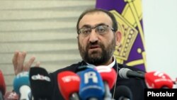 Armenia-Archbishop Arshak Khachatrian speaks during a press conference in Yerevan, Armenia, December 1, 2025.
